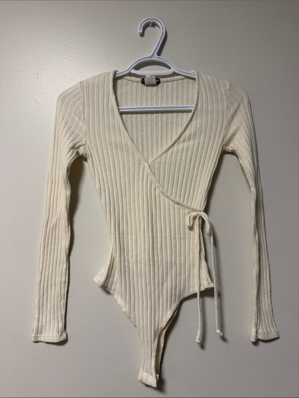 Fashion Nova Cream Ribbed Wrap Long Sleeve Bodysuit